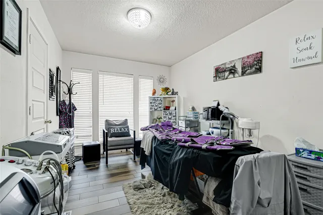 a view of a kitchen from the hallway