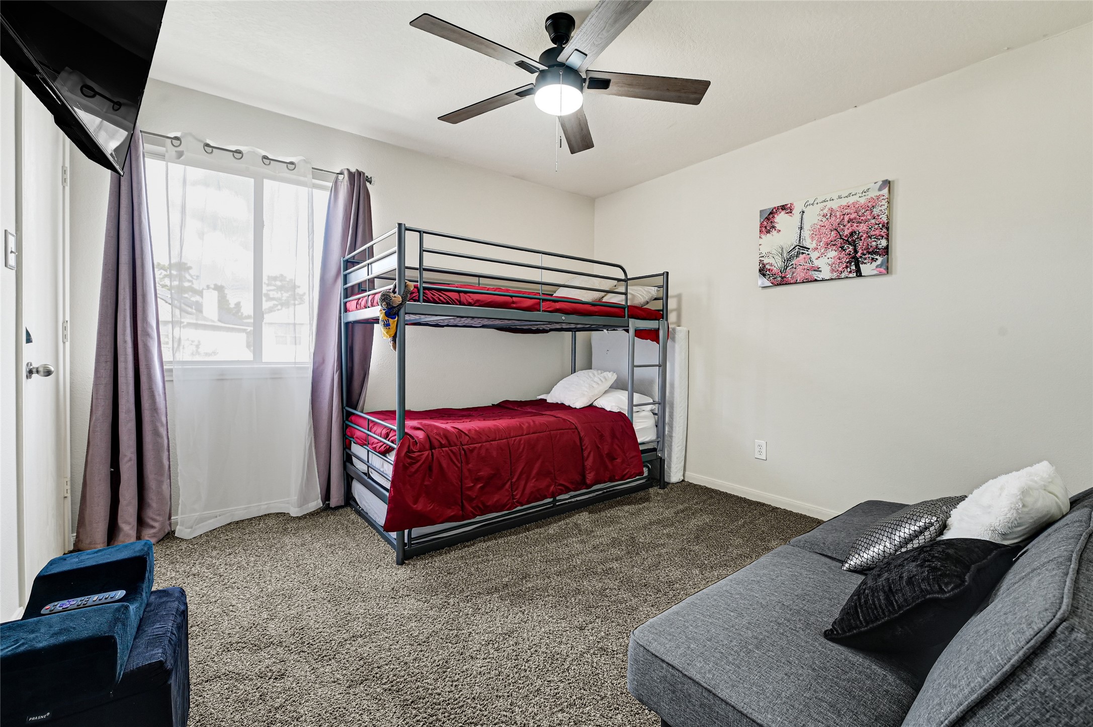 2527 Spring Lily Court Spring, TX 77373 - Photo 25 of 31 a bed room with a bed and a window