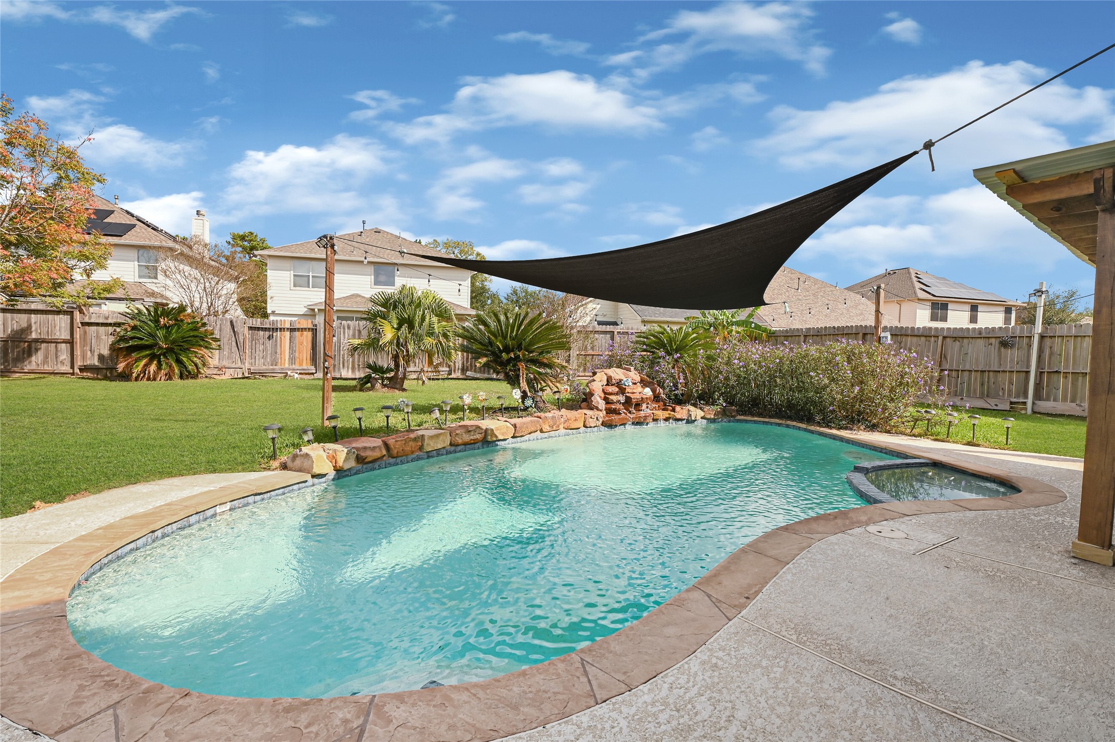 2527 Spring Lily Court Spring, TX 77373 - Photo 28 of 31 a view of a backyard with swimming pool