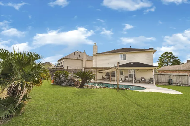 a view of a house with a big yard
