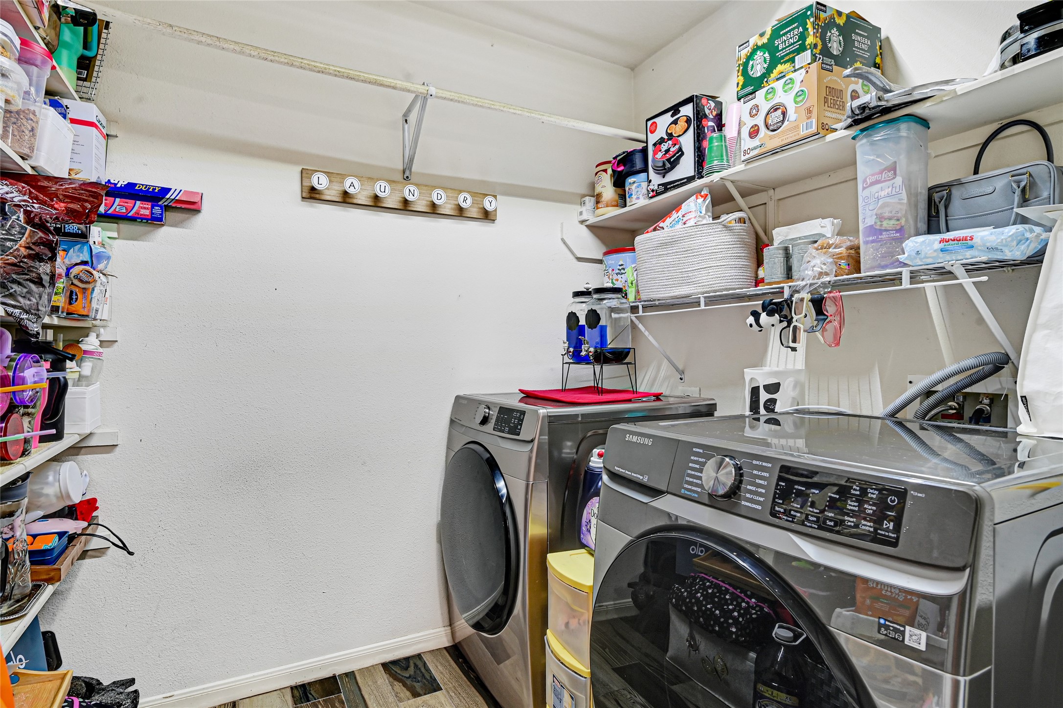2527 Spring Lily Court Spring, TX 77373 - Photo 9 of 31 a utility room with dryer washer and other items