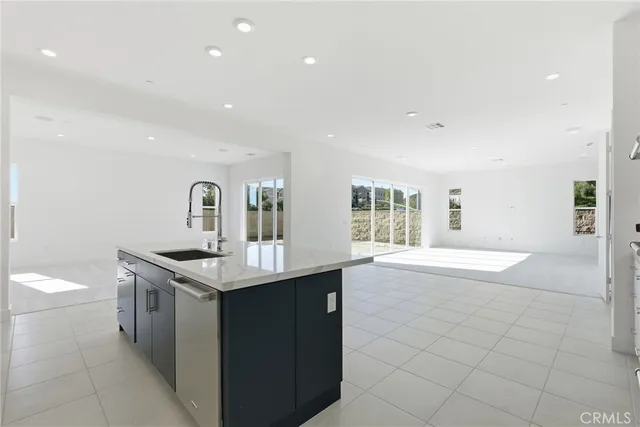 a bathroom with a sink and cabinets