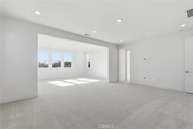 a bathroom with a sink toilet a mirror and shower