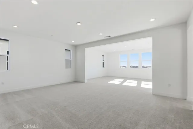 a bathroom with a granite countertop sink a mirror a shower and a bathtub