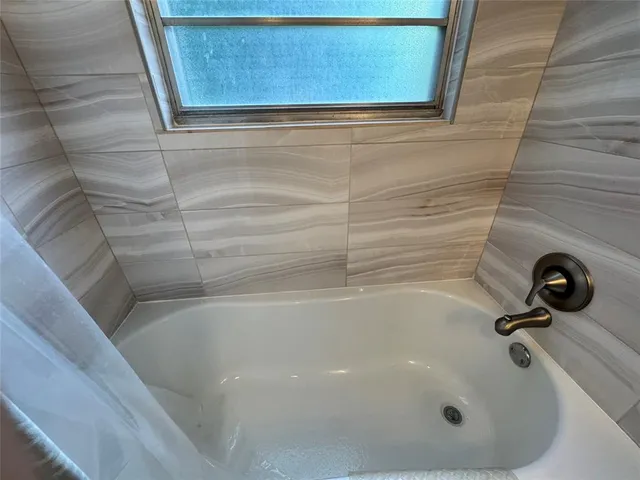 a bathroom with a tub