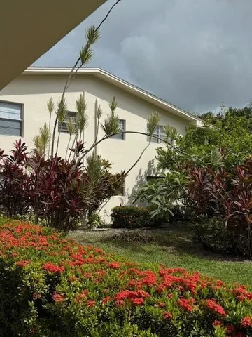 a view of backyard with green space