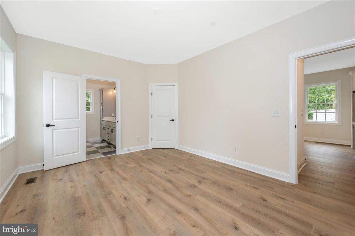 216 Brooks Lane St. Michaels, MD 21663 - Photo 23 of 37 wooden floor in an empty room