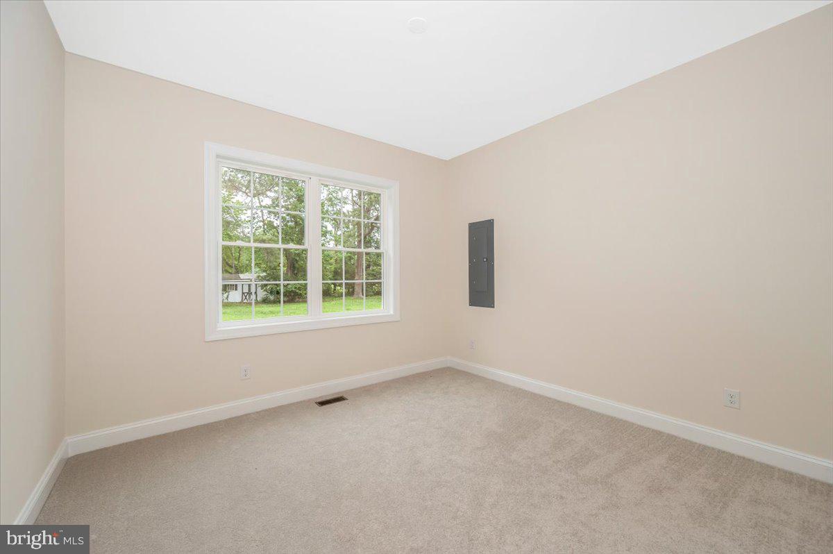 216 Brooks Lane St. Michaels, MD 21663 - Photo 30 of 37 an empty room with a window