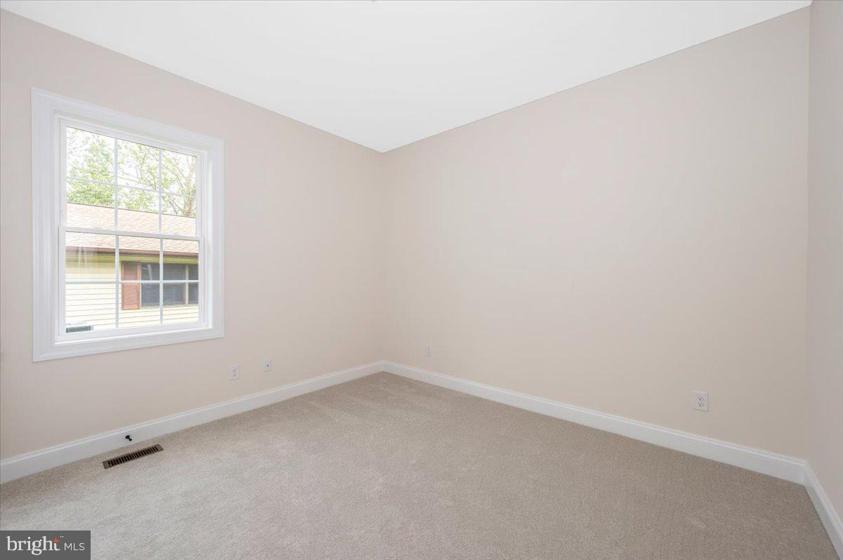 216 Brooks Lane St. Michaels, MD 21663 - Photo 32 of 37 an empty room with a window