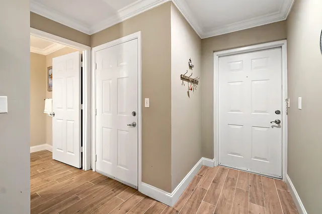 a bathroom with a sink mirror and toilet