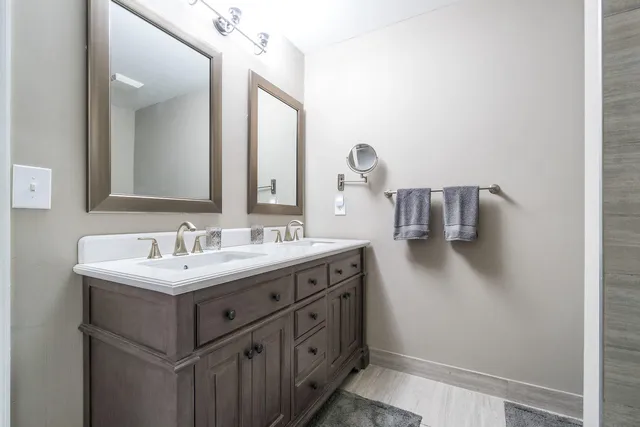 a view of storage and utility room with washer and dryer