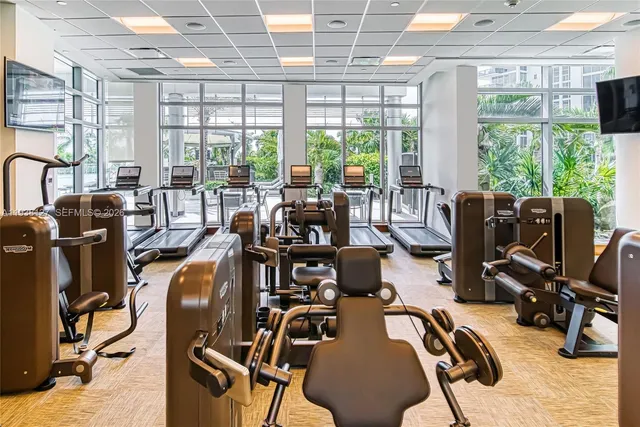 a view of a swimming pool with a patio and a garden