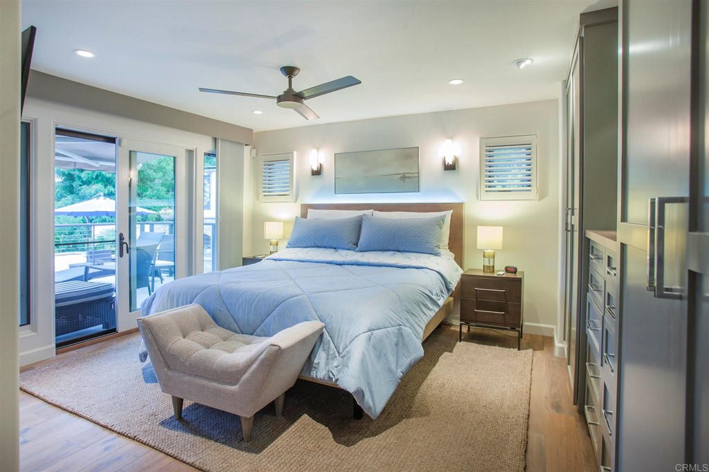 17143 Los Morros Rancho Santa Fe, CA 92067 - Photo 18 of 32 Primary bedroom with a large walk-in closet and two large built in wardrobes.