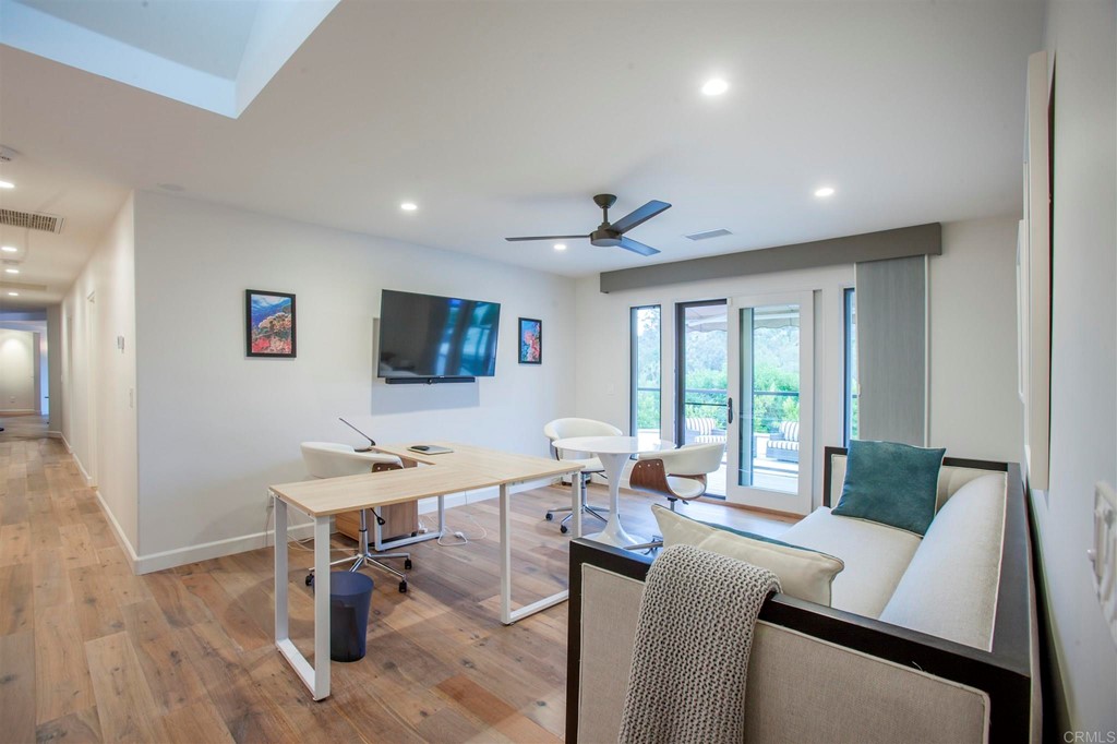17143 Los Morros Rancho Santa Fe, CA 92067 - Photo 22 of 32 Light and bright office with built in cabinetry with sliding doors to the pool area.