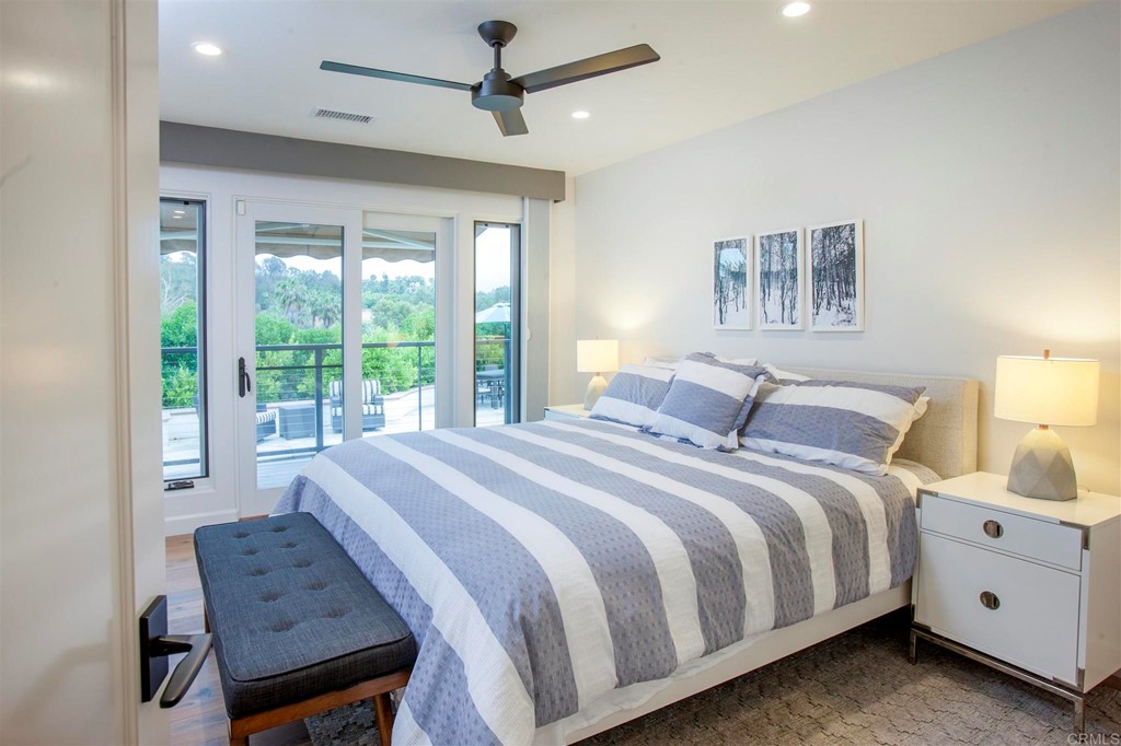 17143 Los Morros Rancho Santa Fe, CA 92067 - Photo 25 of 32 Third large bedroom with closets and sliding doors to the outside.