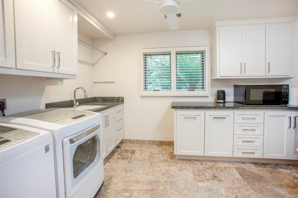 17143 Los Morros Rancho Santa Fe, CA 92067 - Photo 26 of 32 Much more than a laundry room. Coffee station and refreshment station too.