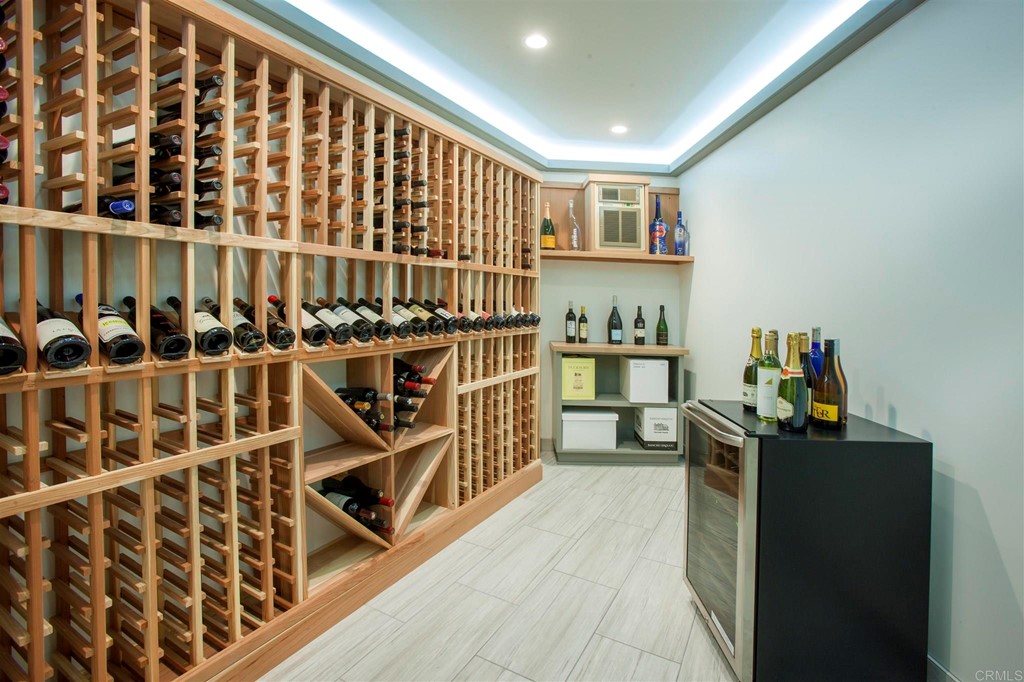 17143 Los Morros Rancho Santa Fe, CA 92067 - Photo 29 of 32 Temperature controlled wine room for over 200 bottles and room for more. Cheers!