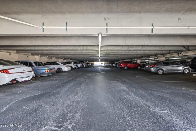 a view of parking with cars