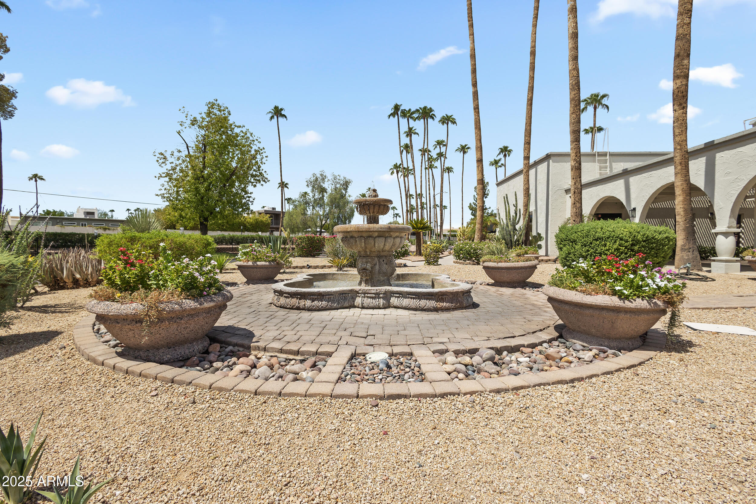 7920 East Camelback Road, Unit 601 Scottsdale, AZ 85251 - Photo 28 of 35 a view of water fountain in the backyard