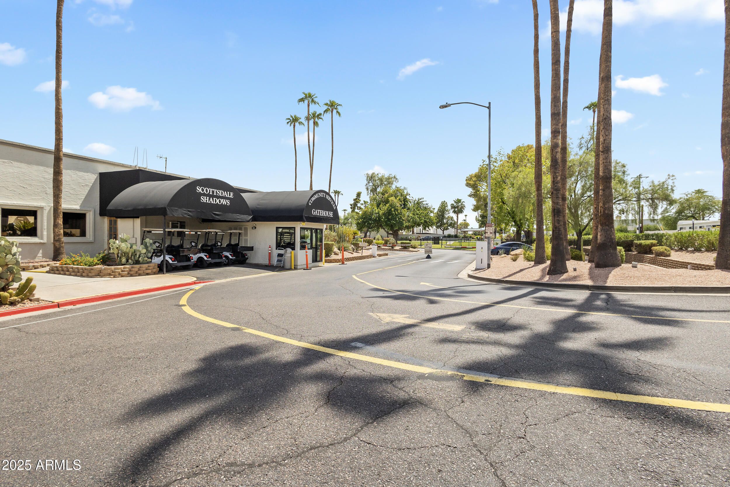 7920 East Camelback Road, Unit 601 Scottsdale, AZ 85251 - Photo 29 of 35 a building with view of street