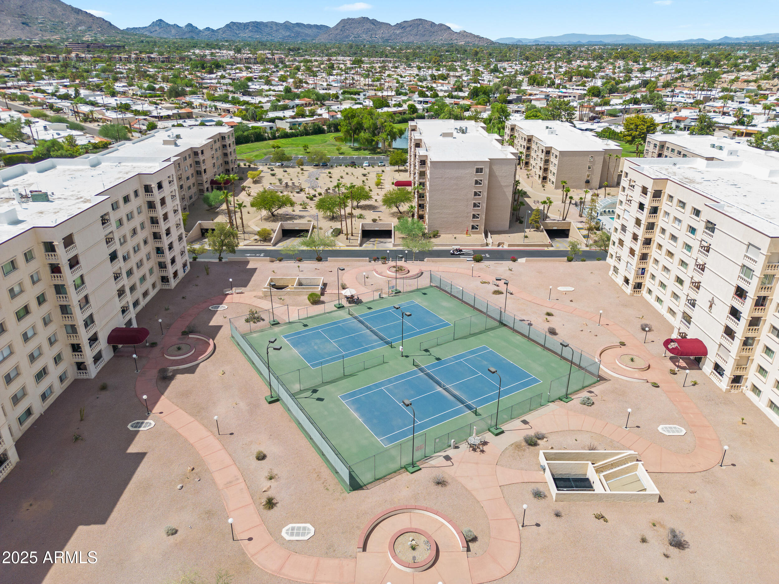 7920 East Camelback Road, Unit 601 Scottsdale, AZ 85251 - Photo 33 of 35 an aerial view of residential houses with outdoor space