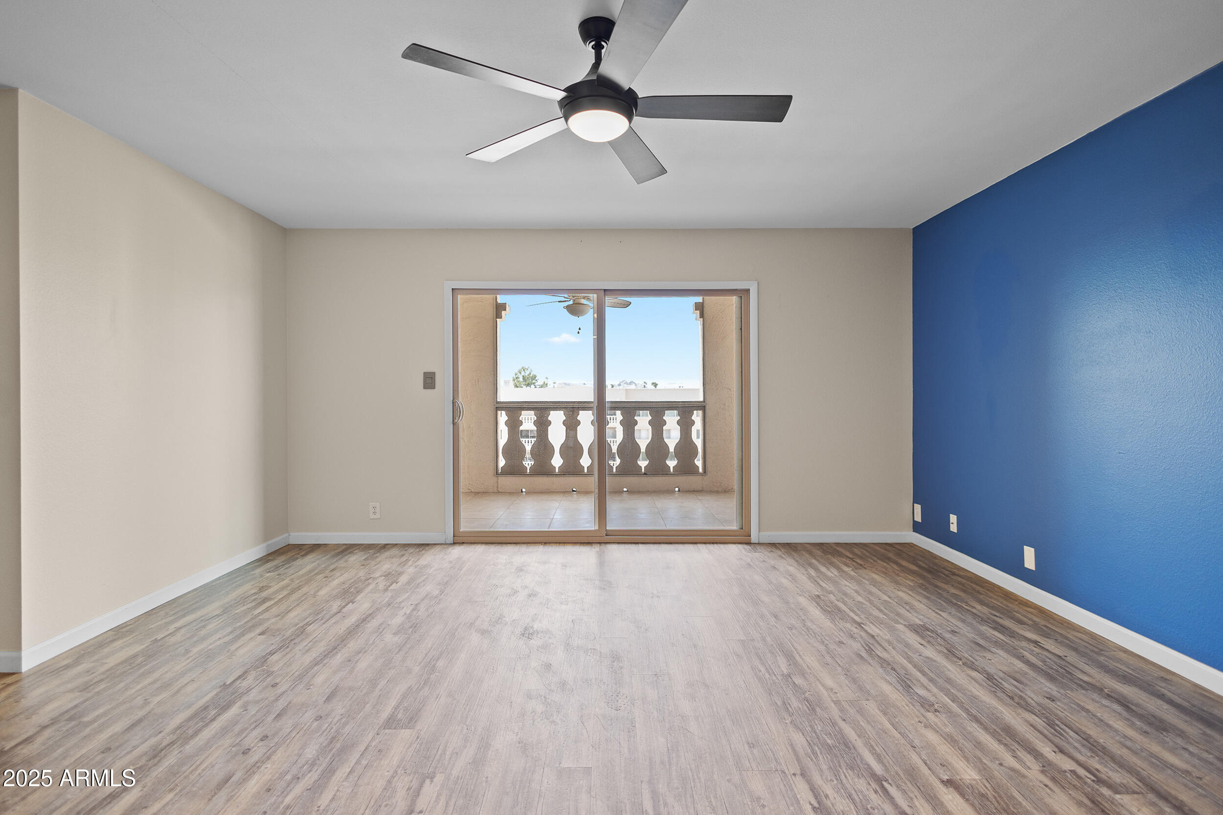 7920 East Camelback Road, Unit 601 Scottsdale, AZ 85251 - Photo 7 of 31 a view of an empty room with a window
