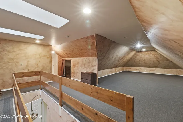 a view of an entryway with sitting area