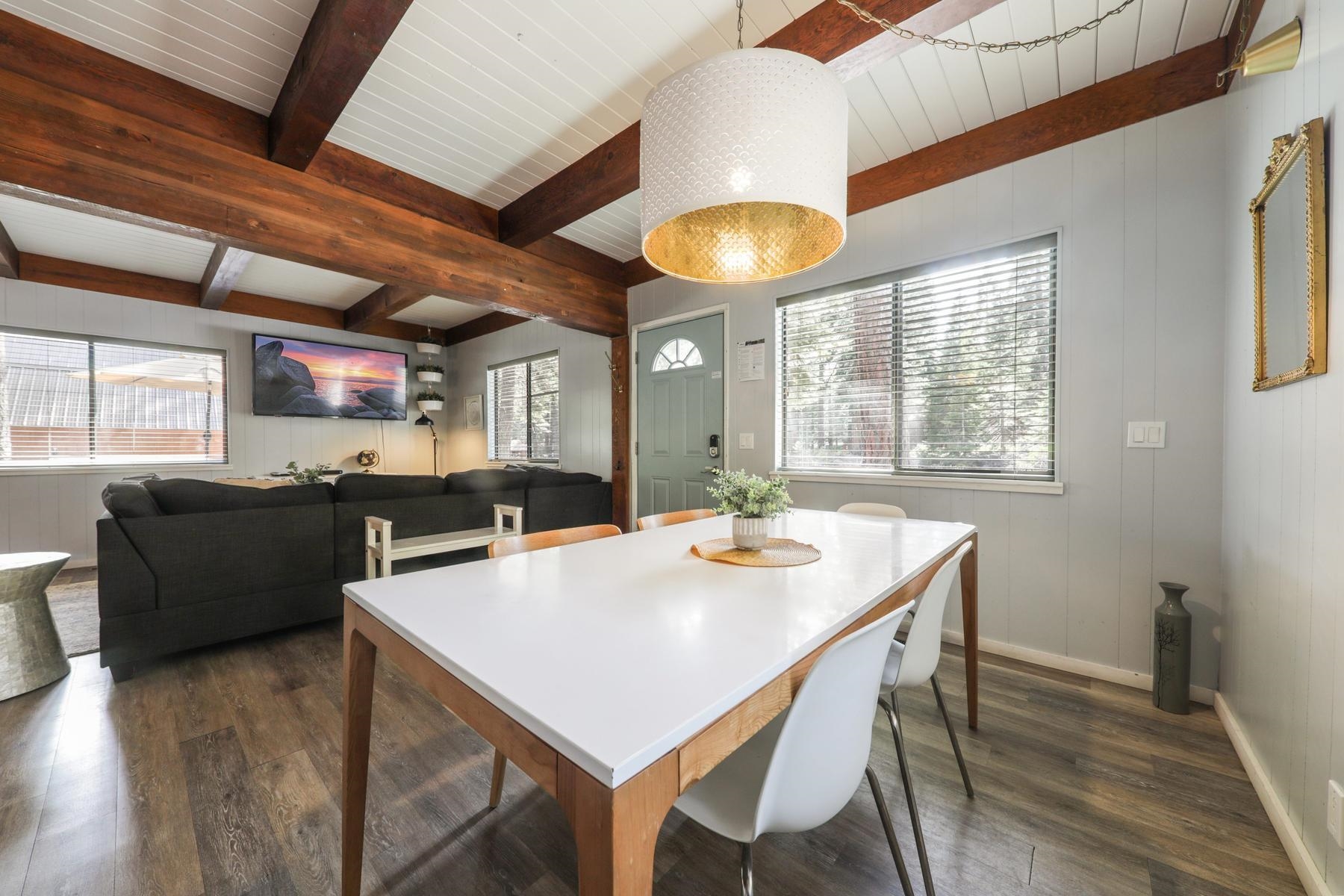 5656 Victoria Road Carnelian Bay, CA 96140 - Photo 12 of 28 a view of a dining room with furniture and window