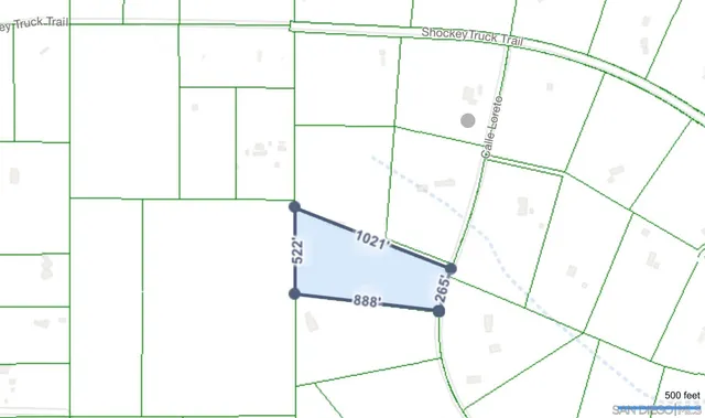 a aerial view of a house with a yard