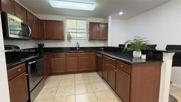 $450,000 | 11605 Northwest 89th Street, Unit 220, Doral, FL 33178