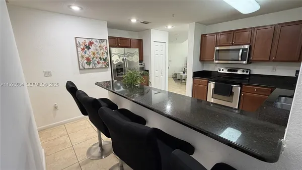 $450,000 | 11605 Northwest 89th Street, Unit 220, Doral, FL 33178