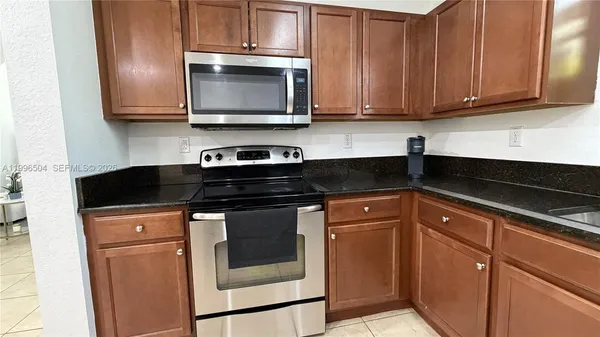 $450,000 | 11605 Northwest 89th Street, Unit 220, Doral, FL 33178