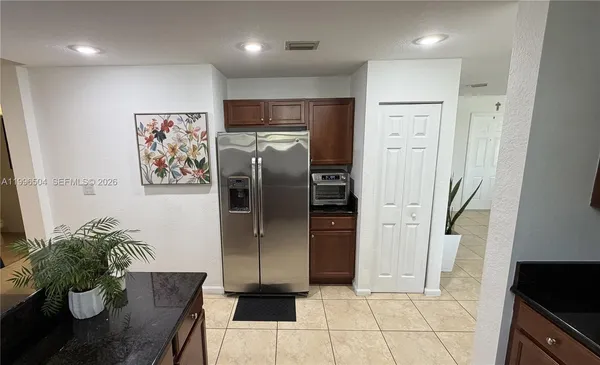 $450,000 | 11605 Northwest 89th Street, Unit 220, Doral, FL 33178