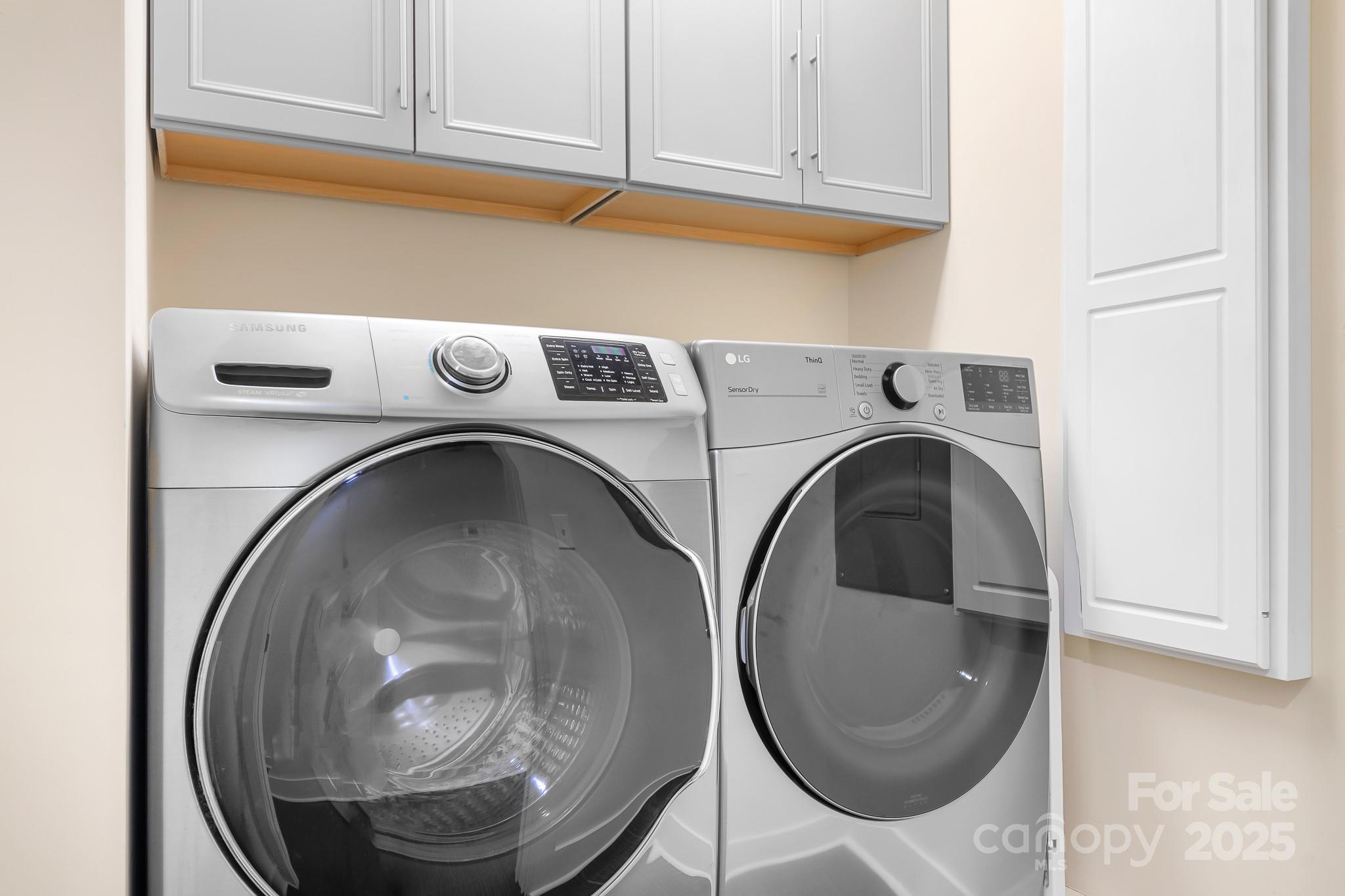 3249 Ivey Creek Road Maiden, NC 28650 - Photo 29 of 45 a close view of utility and utility room with washer and dryer