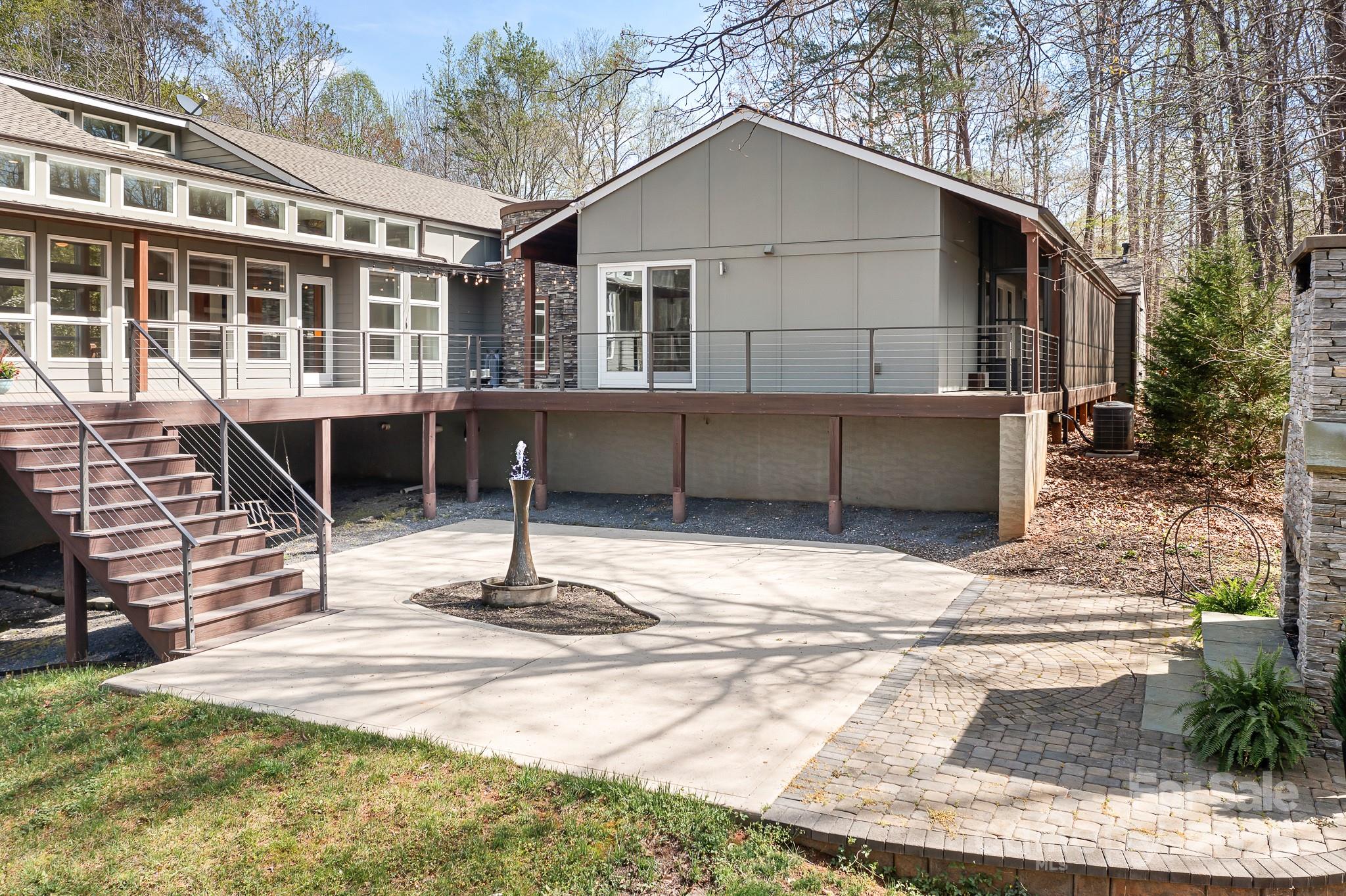 3249 Ivey Creek Road Maiden, NC 28650 - Photo 40 of 45 a view of house with backyard and deck