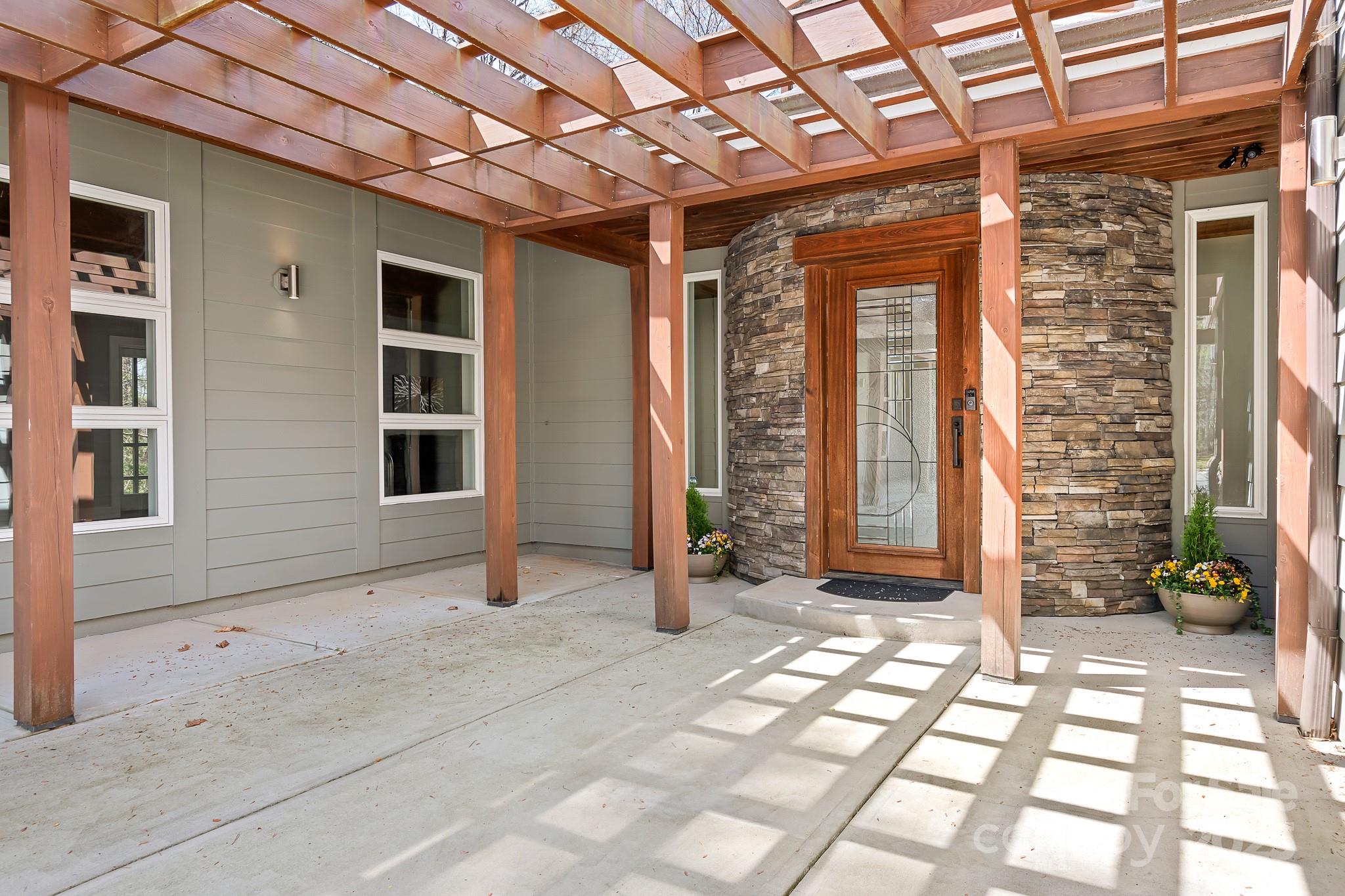 3249 Ivey Creek Road Maiden, NC 28650 - Photo 9 of 45 a view of empty room with windows