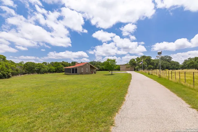 a view of a house with a big yard