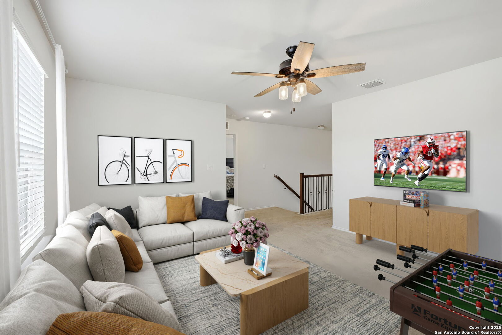 7710 Pecos Boerne, TX 78015 - Photo 22 of 34 a living room with furniture and a flat screen tv