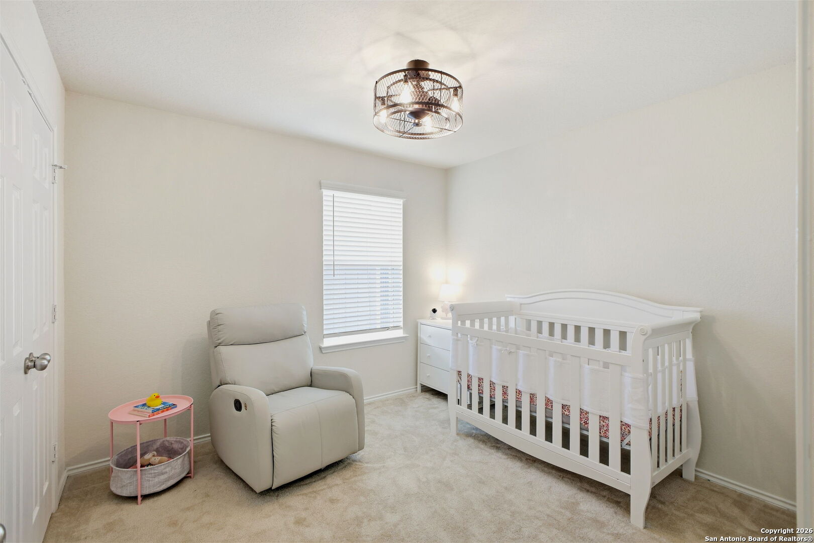 7710 Pecos Boerne, TX 78015 - Photo 26 of 34 a bedroom with a bed and a window