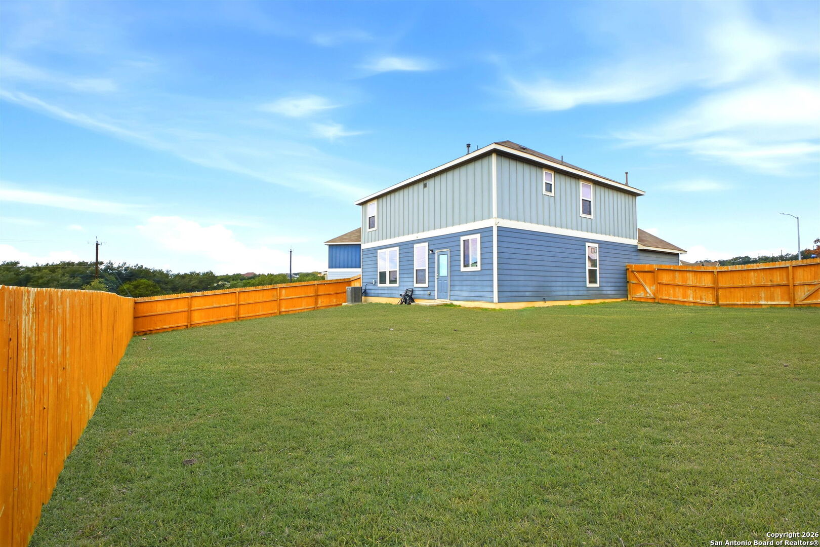 7710 Pecos Boerne, TX 78015 - Photo 29 of 34 a view of a house with a swimming pool