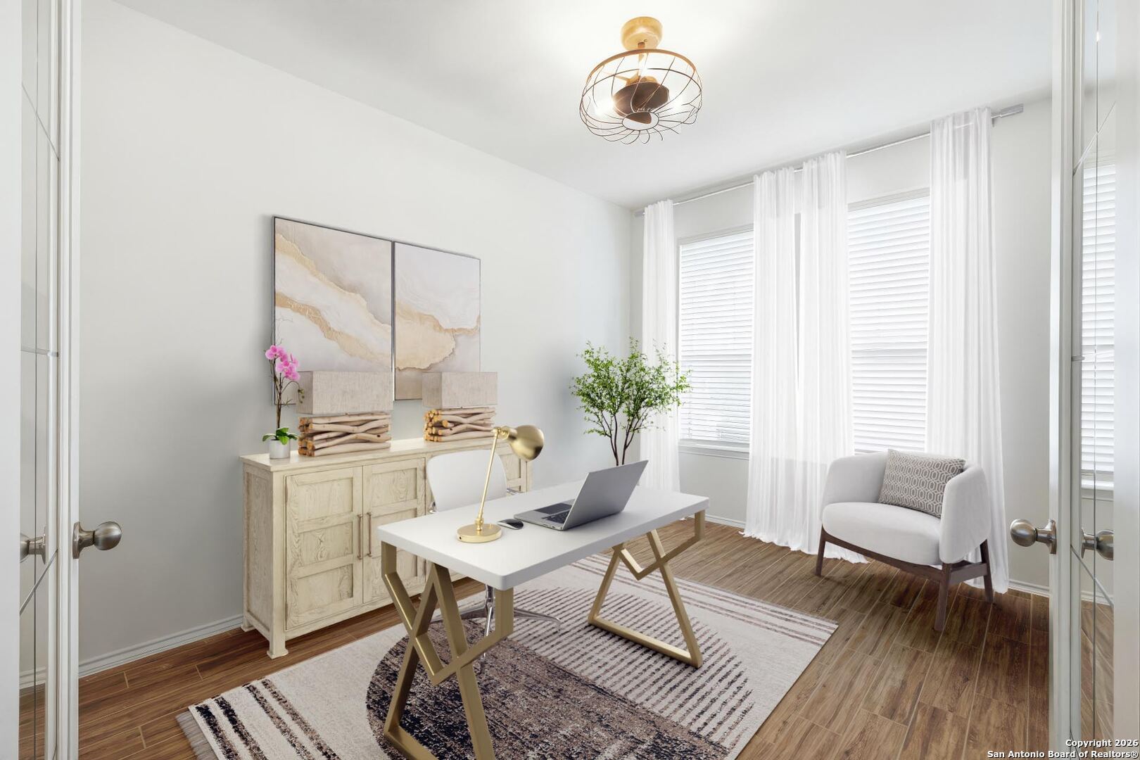 7710 Pecos Boerne, TX 78015 - Photo 7 of 34 a workspace with furniture and a potted plant