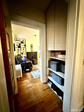 a view of living room with furniture and window