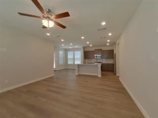 a view of a kitchen with a sink and dishwasher