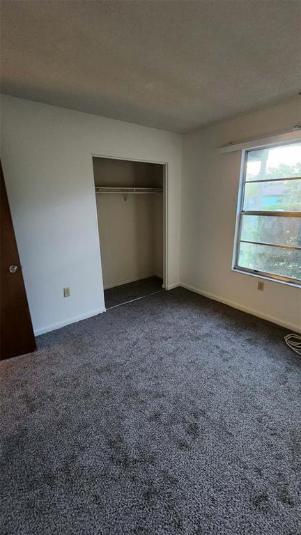 62 Silver Lane Ocala, FL 34472 - Photo 22 of 25 an empty room with a fireplace