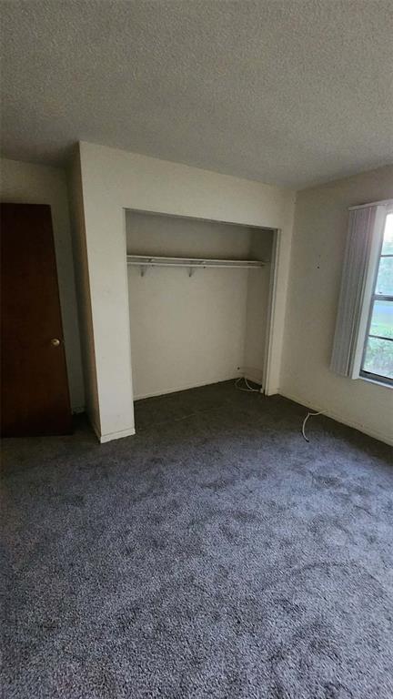 62 Silver Lane Ocala, FL 34472 - Photo 23 of 25 an empty room with a fireplace
