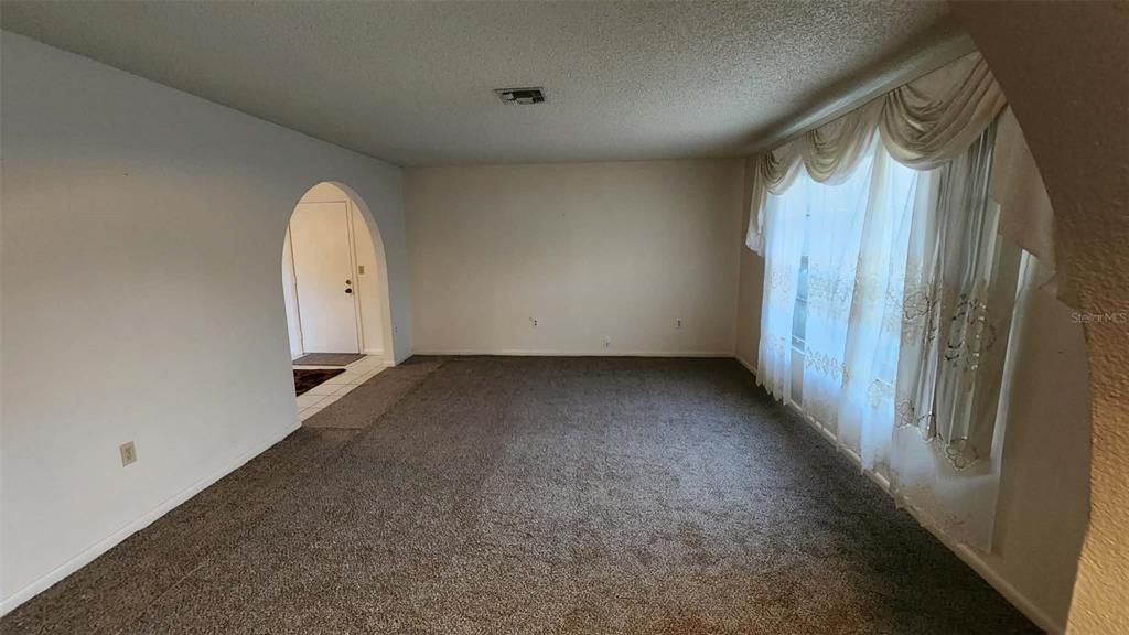 62 Silver Lane Ocala, FL 34472 - Photo 4 of 25 a view of a room with window