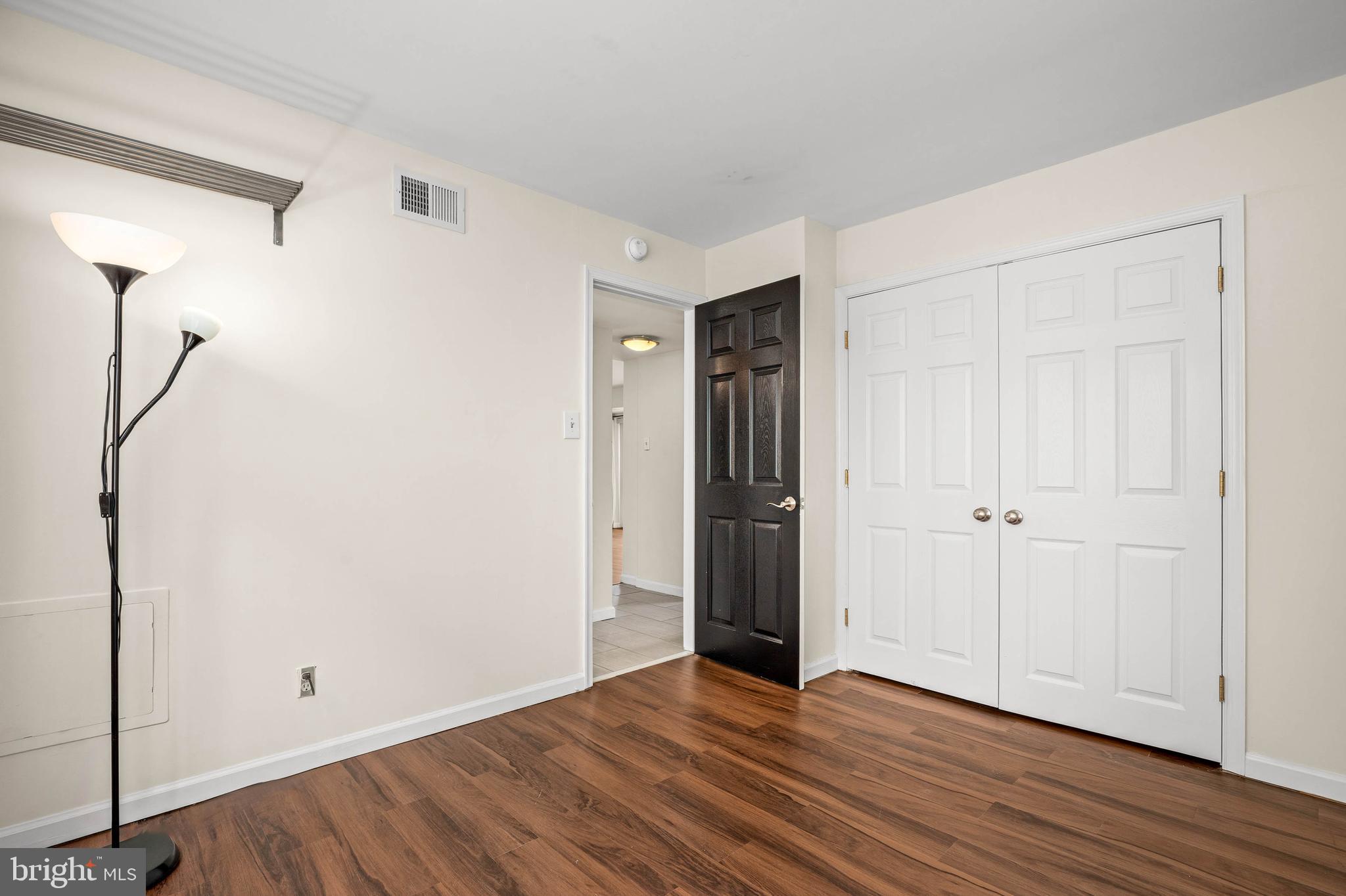 1920 Naylor Road Southeast, Unit T2 Washington, DC 20020 - Photo 20 of 25 a view of empty room with wooden floor
