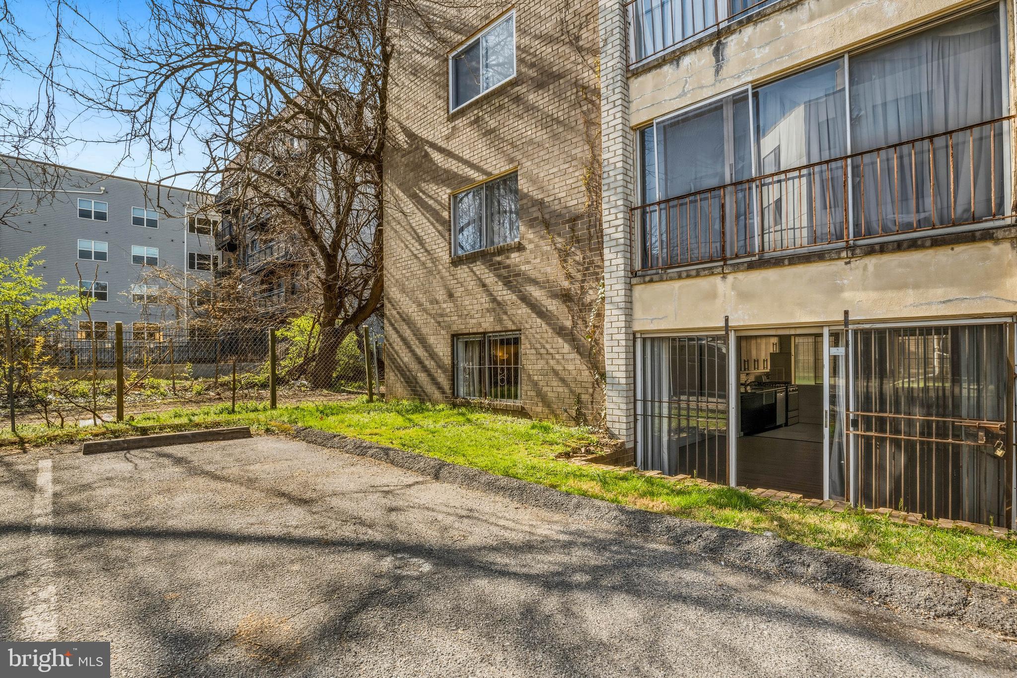 1920 Naylor Road Southeast, Unit T2 Washington, DC 20020 - Photo 24 of 25 a view of a brick house with an outdoor space