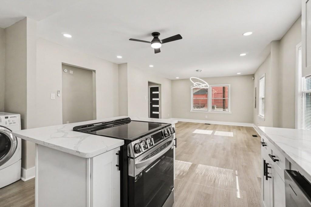 1515 Jonesboro Road Southeast Atlanta, GA 30315 - Photo 17 of 32 a kitchen that has a sink and a stove