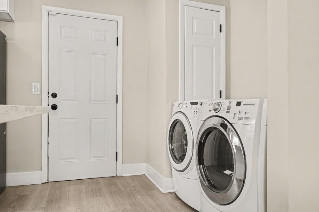 1515 Jonesboro Road Southeast Atlanta, GA 30315 - Photo 20 of 32 a view of a hallway with washer and dryer